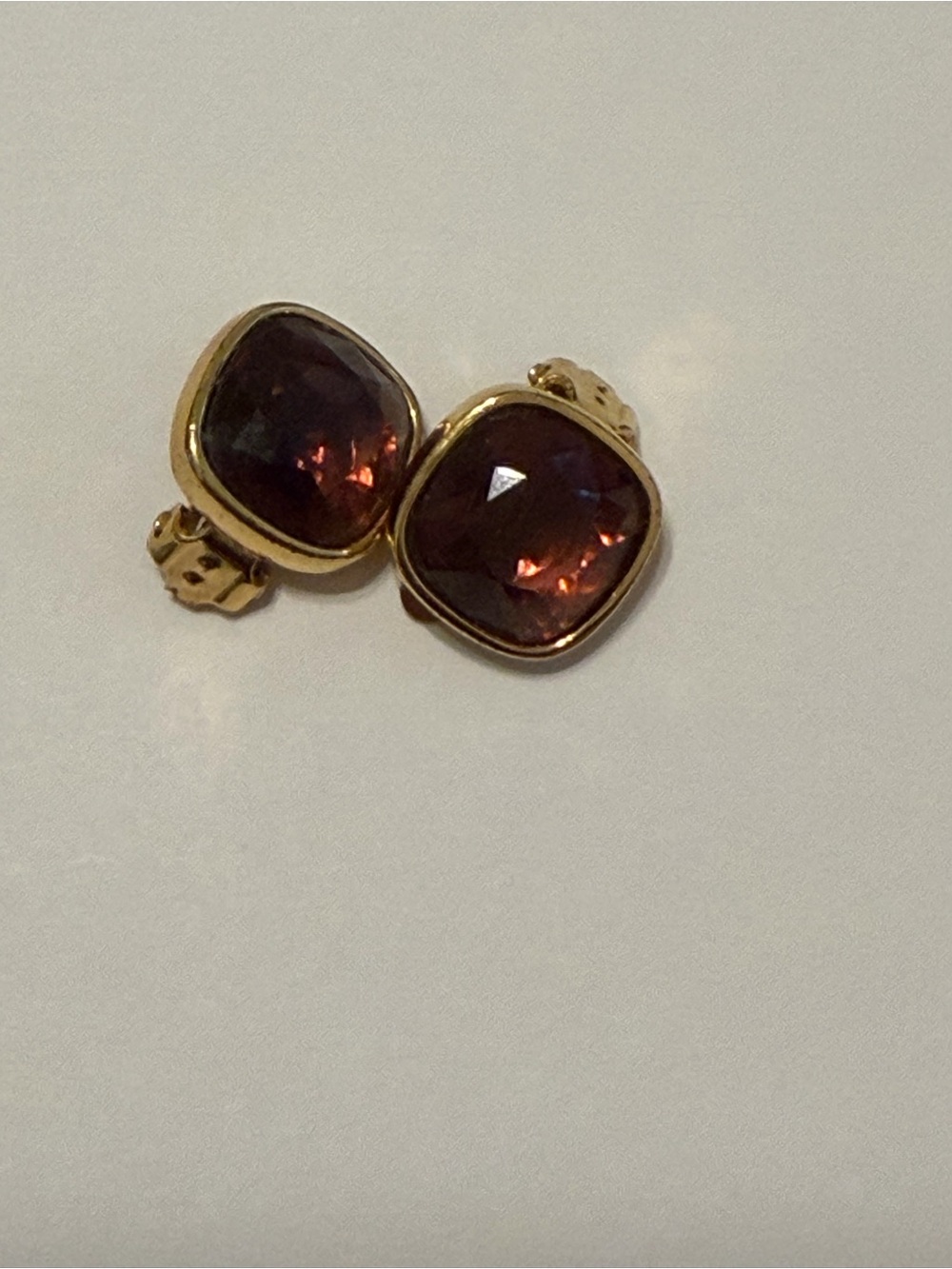 SWAROVSKI Gold-Tone Earrings with Deep Garnet Red Cushion Stones
